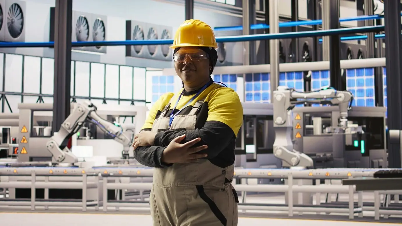 Portrait of a smiling technician at an industrial plant diagnosing equipment.